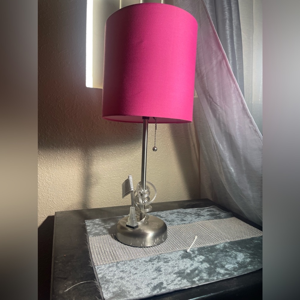 Pink charging outlet table lamp